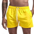 Gelbe Badeshorts für Herren mit Kordelzug, elastischem Bund