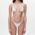 White micro triangle bikini with Brazilian thong, thin string sides