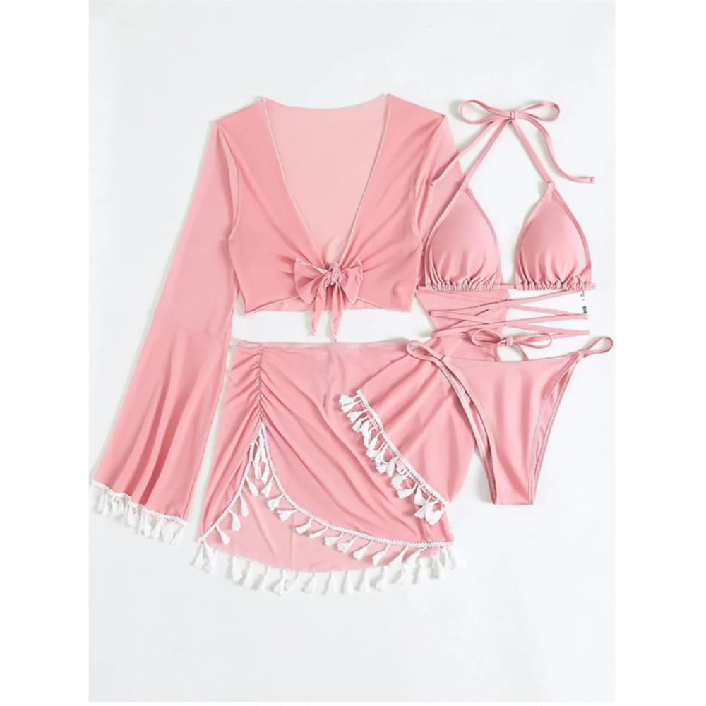 Pink boho tassel bikini set with a matching long-sleeved tassel skirt cover-up featuring white tassels along the hem