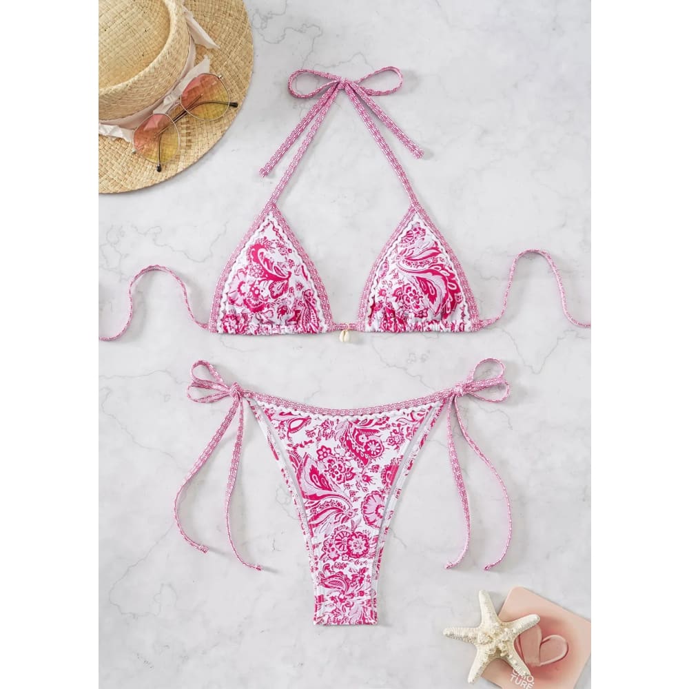 Floral push-up triangle bikini set with pink and white paisley pattern and glittery pink ties with brazilian bottoms