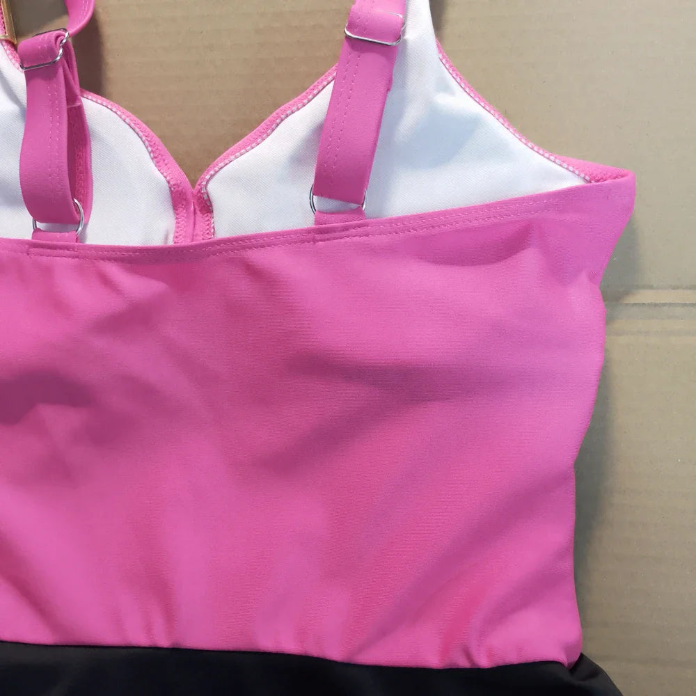 Pink and white tummy control swimdress one-piece with adjustable straps for comfortable fit and support