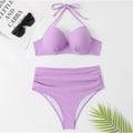 Blue push-up underwire bikini set with ruched high-waist bottoms, halter style.