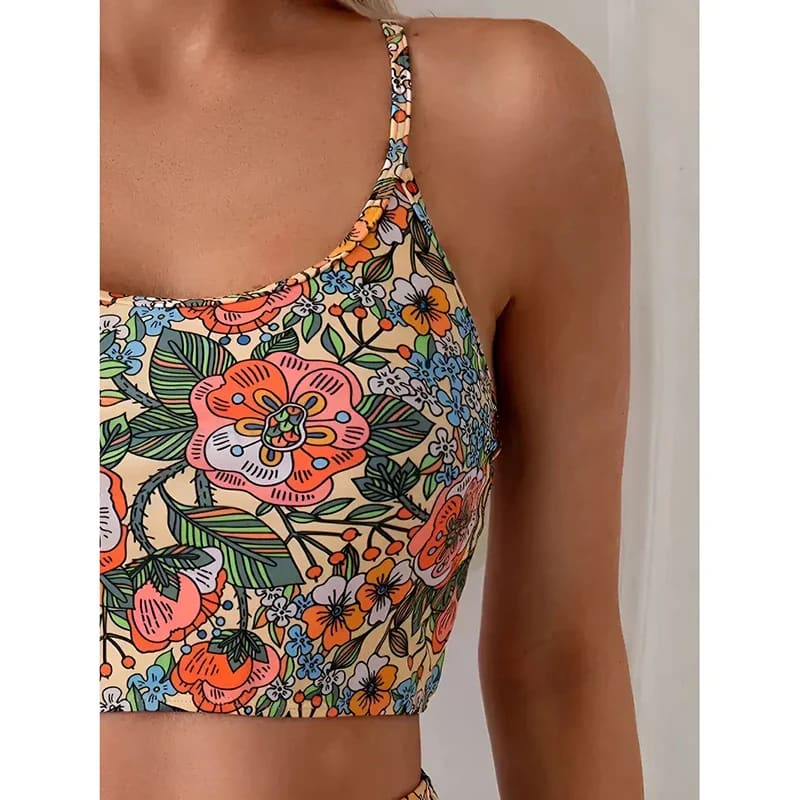 Floral backless bikini top detail with adjustable crisscross straps