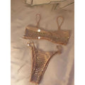 Apricot rhinestone bikini set, bandeau top and thong bottom with sparkle, flat lay