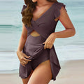 Mauve ruffled cross-skirt one-piece swimsuit with crisscross chest cutout and cape-like drape