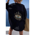 Black cotton shirt with sequin evil-eye motif on back, loose long sleeves