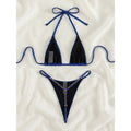 Blue halter triangle bikini top and micro thong bottom with bow ties and bead-like trim