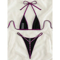 Purple halter triangle bikini top and micro thong bottom with bow and chain jewel trim