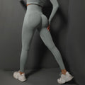Light gray high-waist yoga leggings with booty-lifting contour seams, full-length