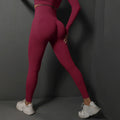 High-waist yoga leggings, wine red, contoured hip and thigh seams