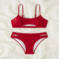 Red hollow-out bikini set: scoop-neck bra top and matching high-waist briefs