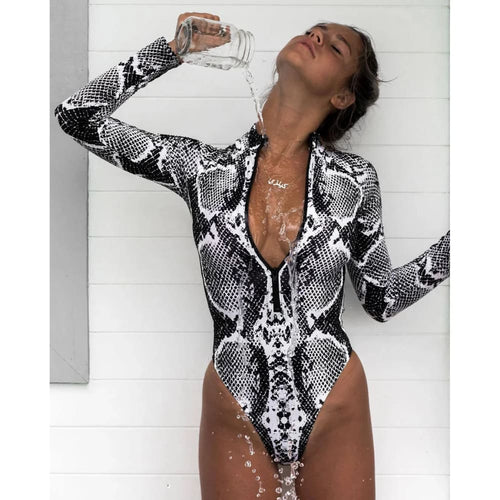 Long-sleeve monokini with black-and-white snake print and front zipper