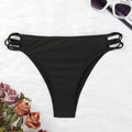 Black low-waist thong bikini bottom, solid front with side strap ties