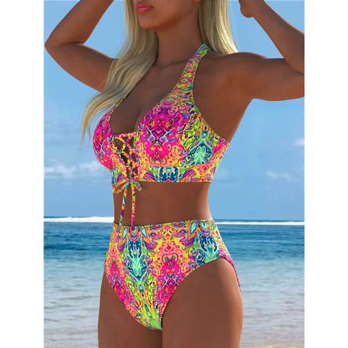 Vibrant neon paisley patterned two-piece bikini set with halter top and high-waisted bottoms for women