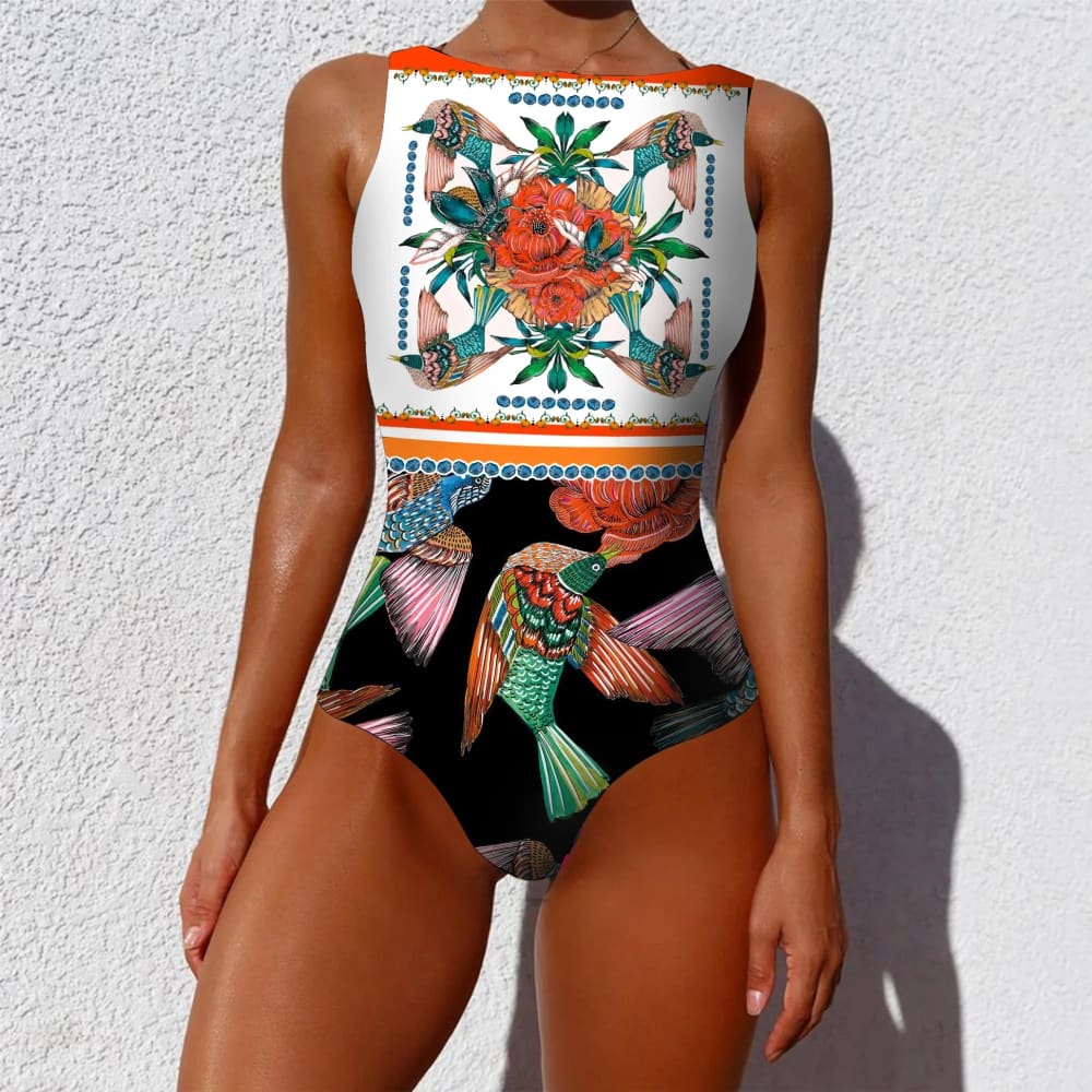 Ethnic floral animal patchwork one-piece swimsuit with bold tropical bird and floral pattern in orange teal pink and green