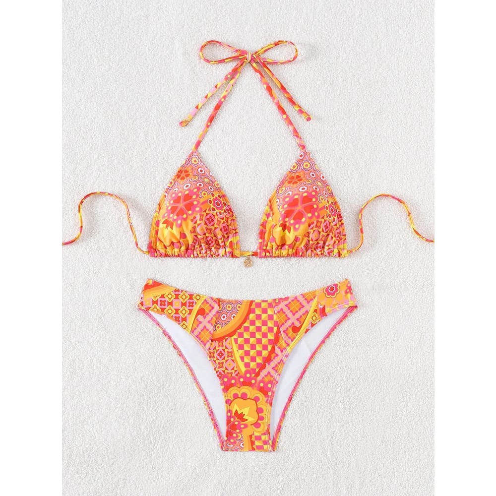 Vibrant orange and pink floral push-up triangle bikini set with matching high-waisted brazilian bottoms