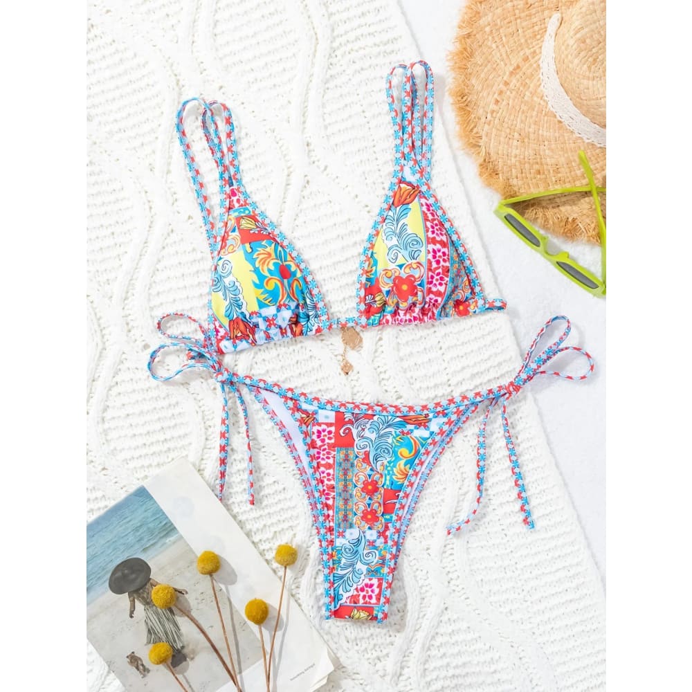 Floral push-up triangle bikini set with vibrant patchwork patterns, braided straps, and colorful brazilian bottoms
