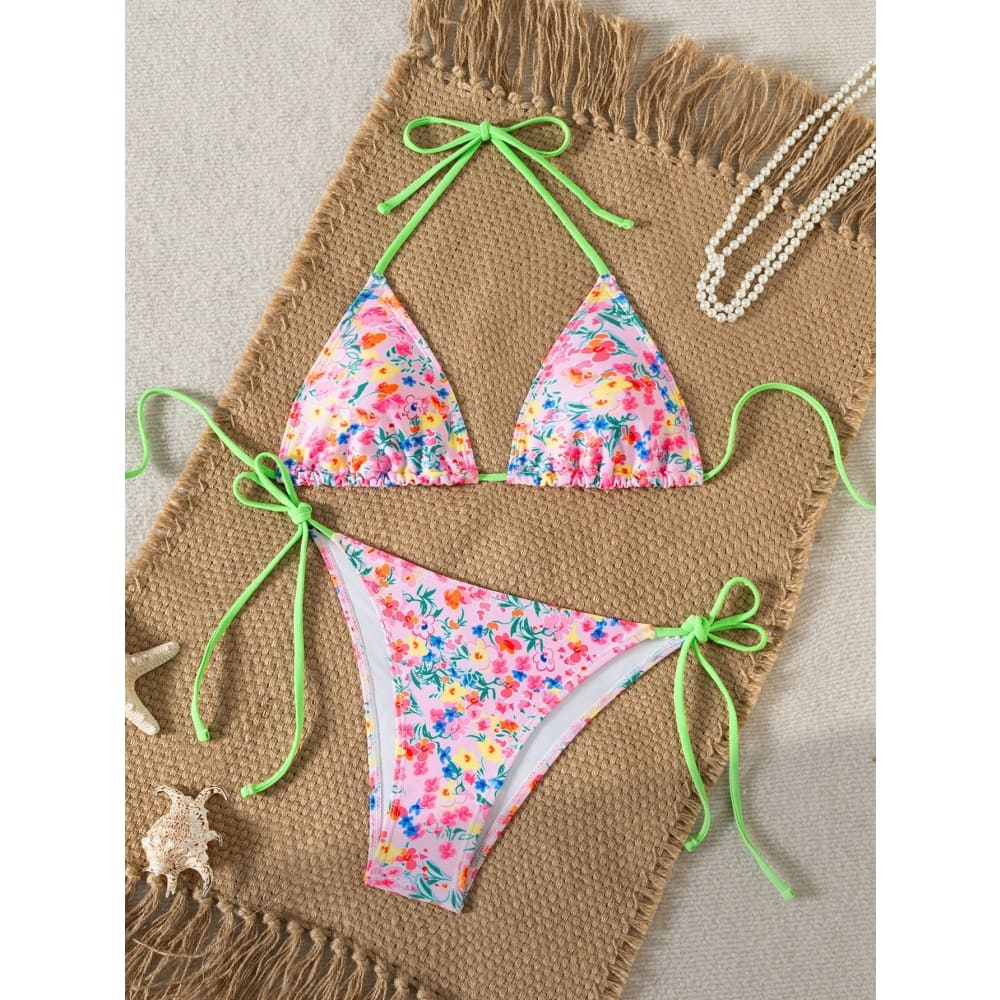 Floral push-up triangle bikini set with vibrant pink floral print neon green ties and ruffled edges brazilian bottoms