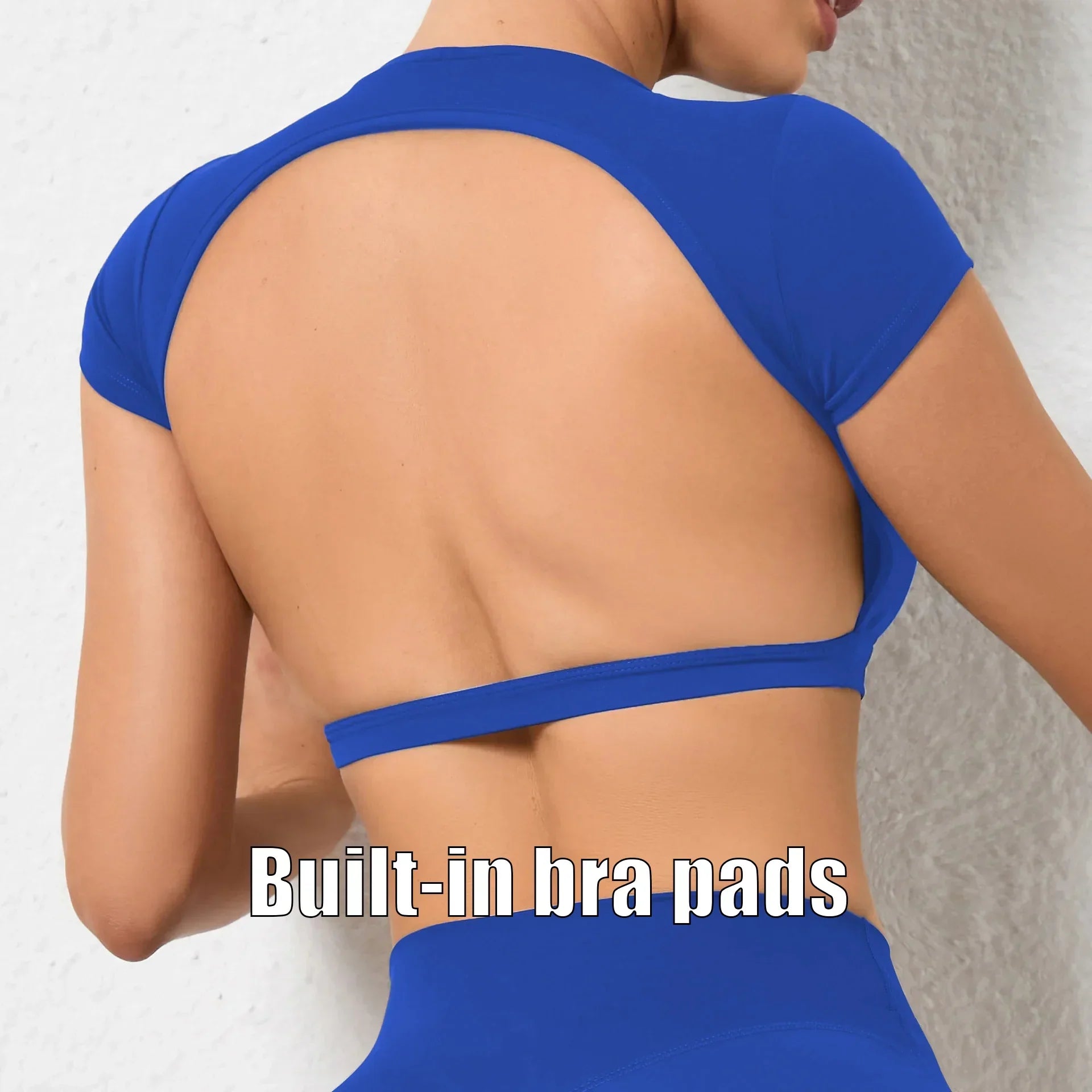 Blue backless sports crop top with built-in bra pads