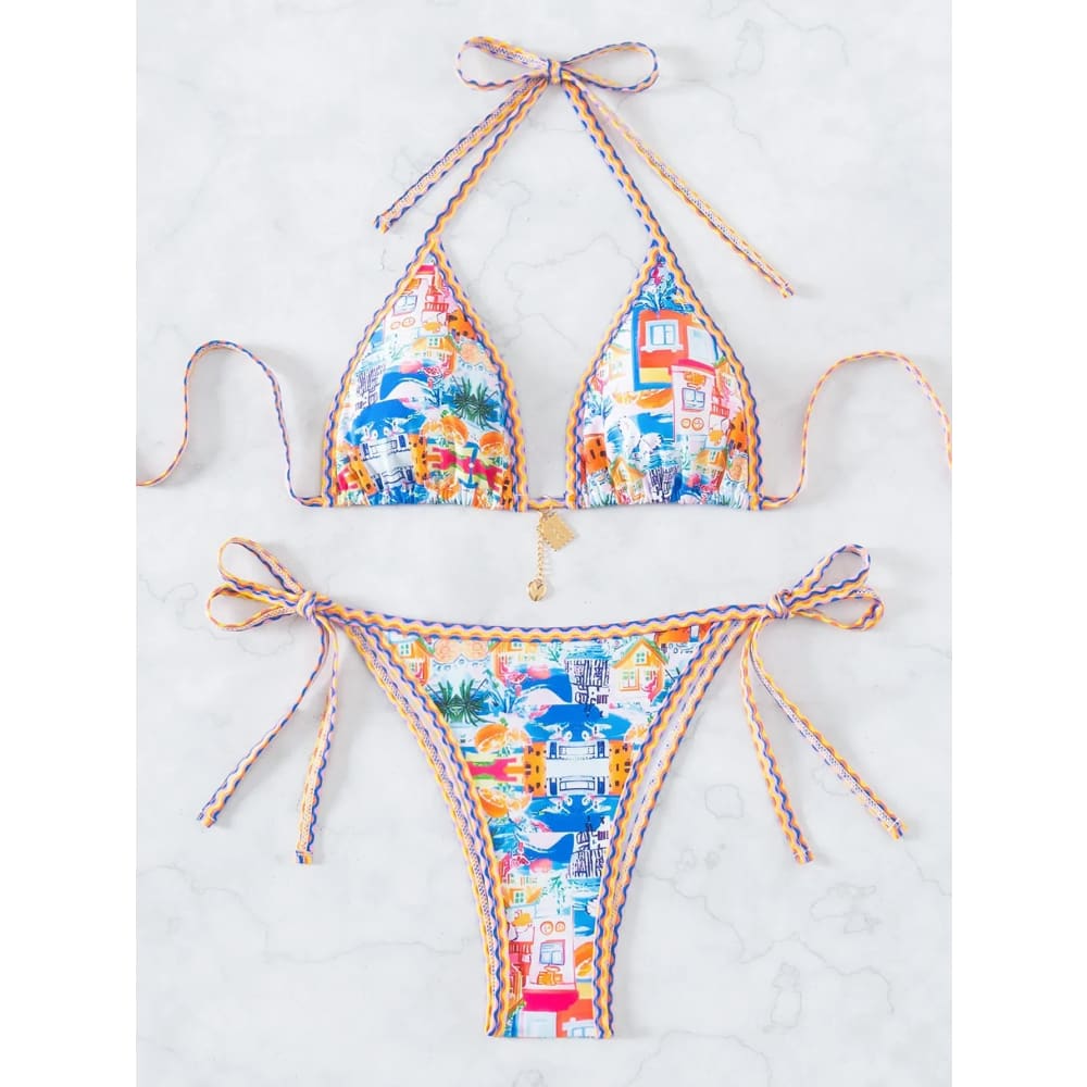 Vibrant tropical-themed floral push-up triangle bikini set with colorful cartoon houses, palm trees, and braided ties with brazilian bottoms
