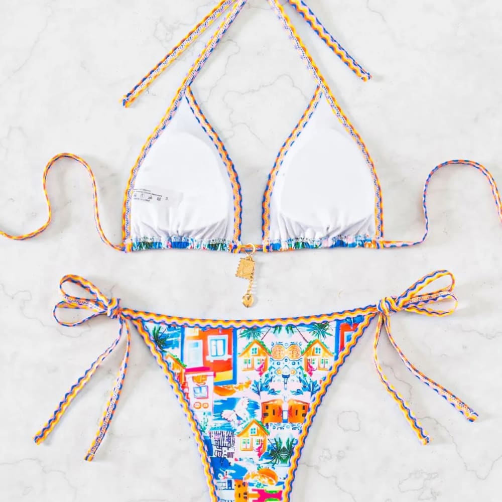 Floral push-up triangle bikini set with vibrant tropical print white top and matching brazilian bottoms