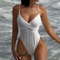 White ribbed high-cut one-piece swimsuit with thin straps and deep V neckline