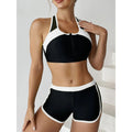 Zipper bikini set: black top and boxer shorts with white trim