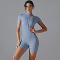 Light blue yoga jumpsuit with front zipper, short sleeves and push-up shorts