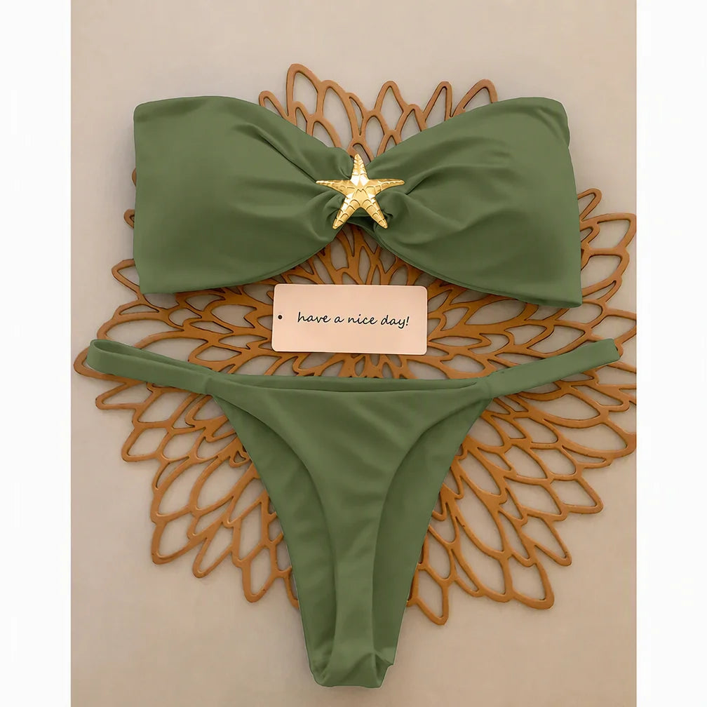Olive green knot bandeau bikini with starfish detail and micro thong bottom on wooden tray