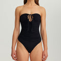 Black strapless plunge one-piece with ruched detailing and central neck tie