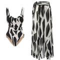 Studio set: black-and-white geometric underwire one-piece and matching sarong wrap
